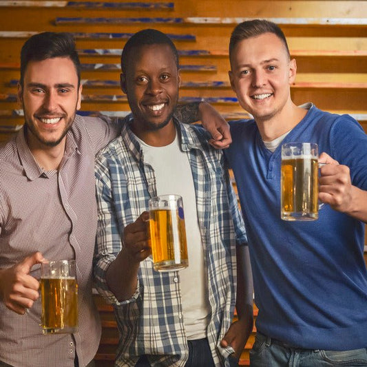 three men holding their beer