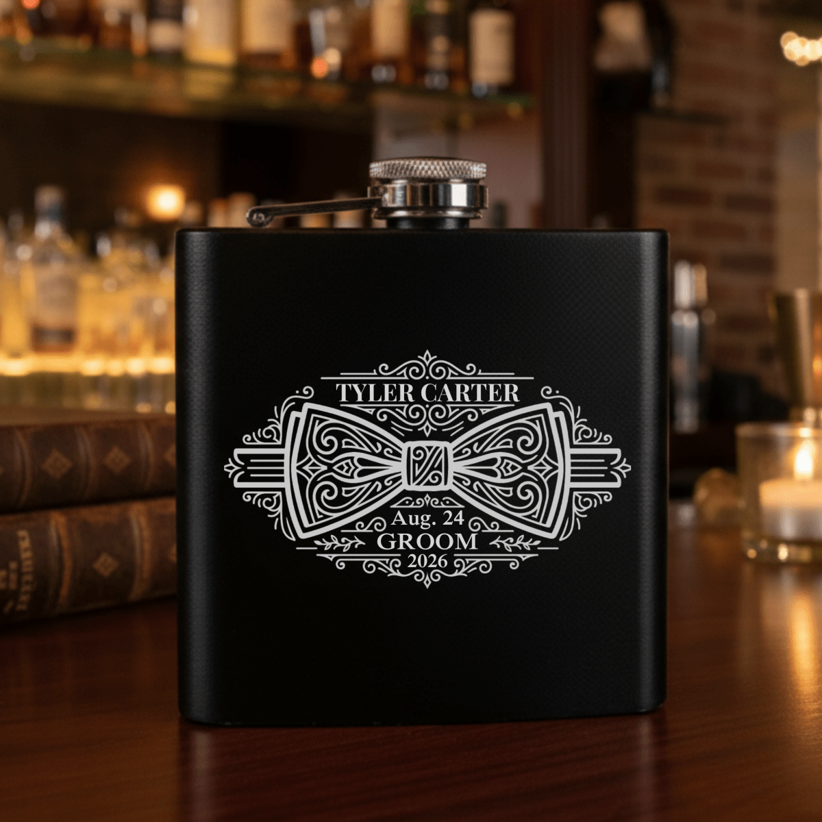 Black flask with white engraving on a bar counter