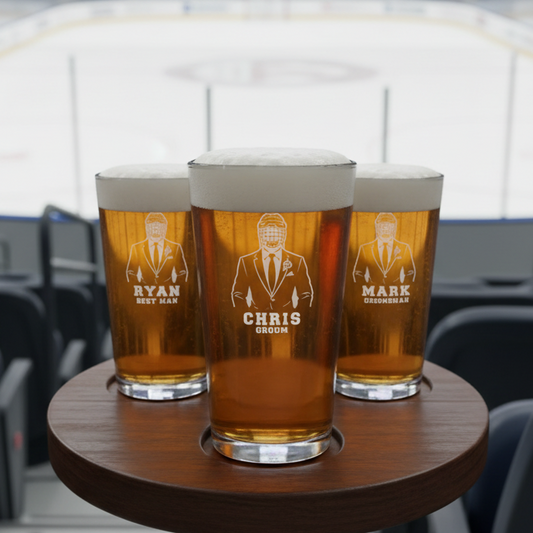 Three pints of beer on a wooden coaster with engraved names and titles.