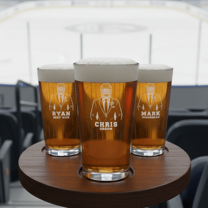Three pints of beer on a wooden coaster with engraved names and titles.