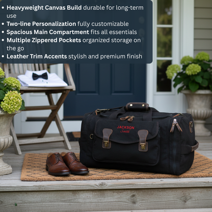 Black canvas duffle bag with brown leather trim and brass hardware, personalized with sample text "JACKSON Smith" in red embroidery, displayed on porch with brown shoes