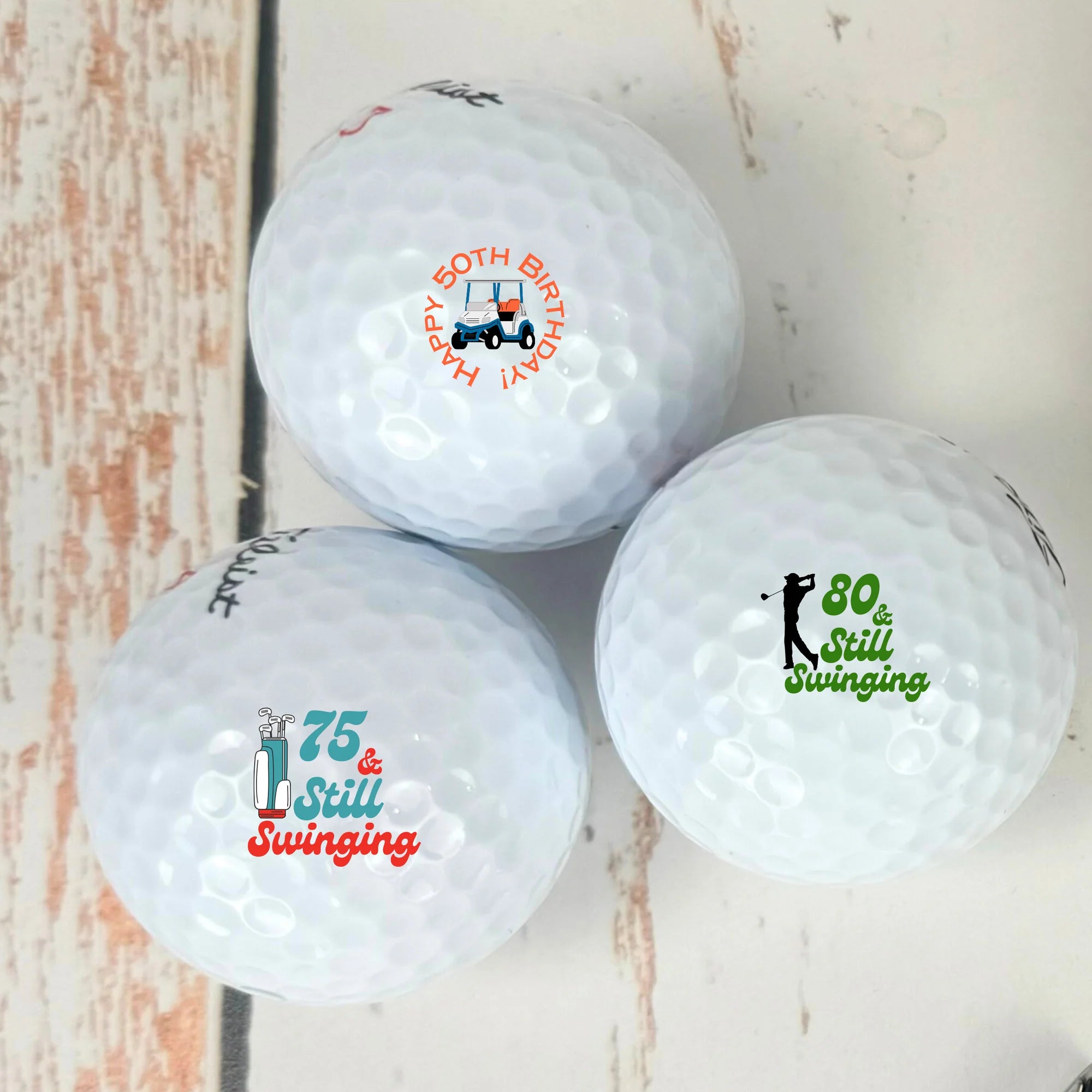 Birthday-themed golf balls with ultra-soft feel, superior distance, and excellent greenside control.