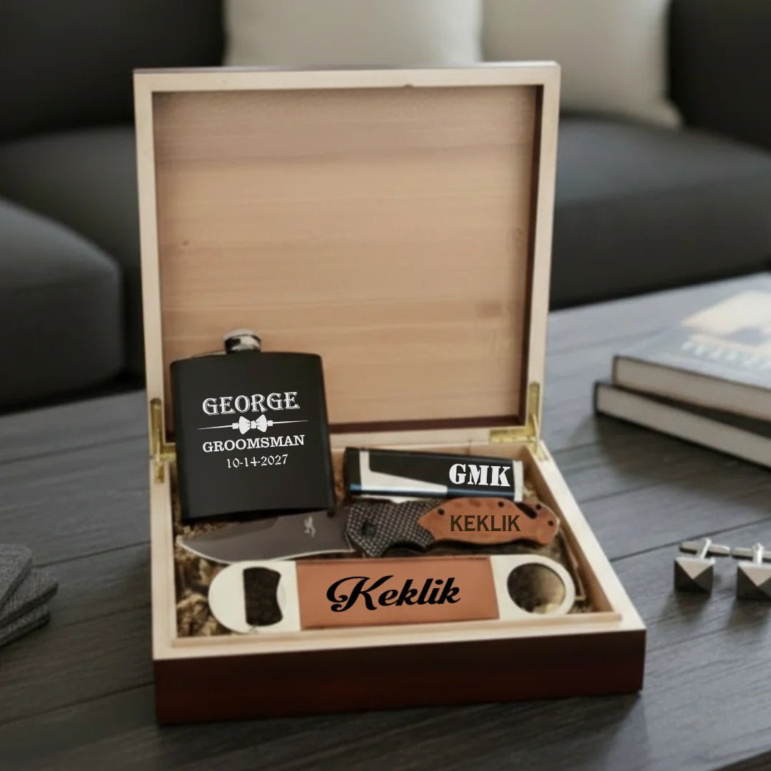 Set of personalized items including a flask, knife, and bottle opener in a wooden box.
