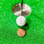 Copper golf ball marker with humorous design, lightweight and perfect for pocket carry