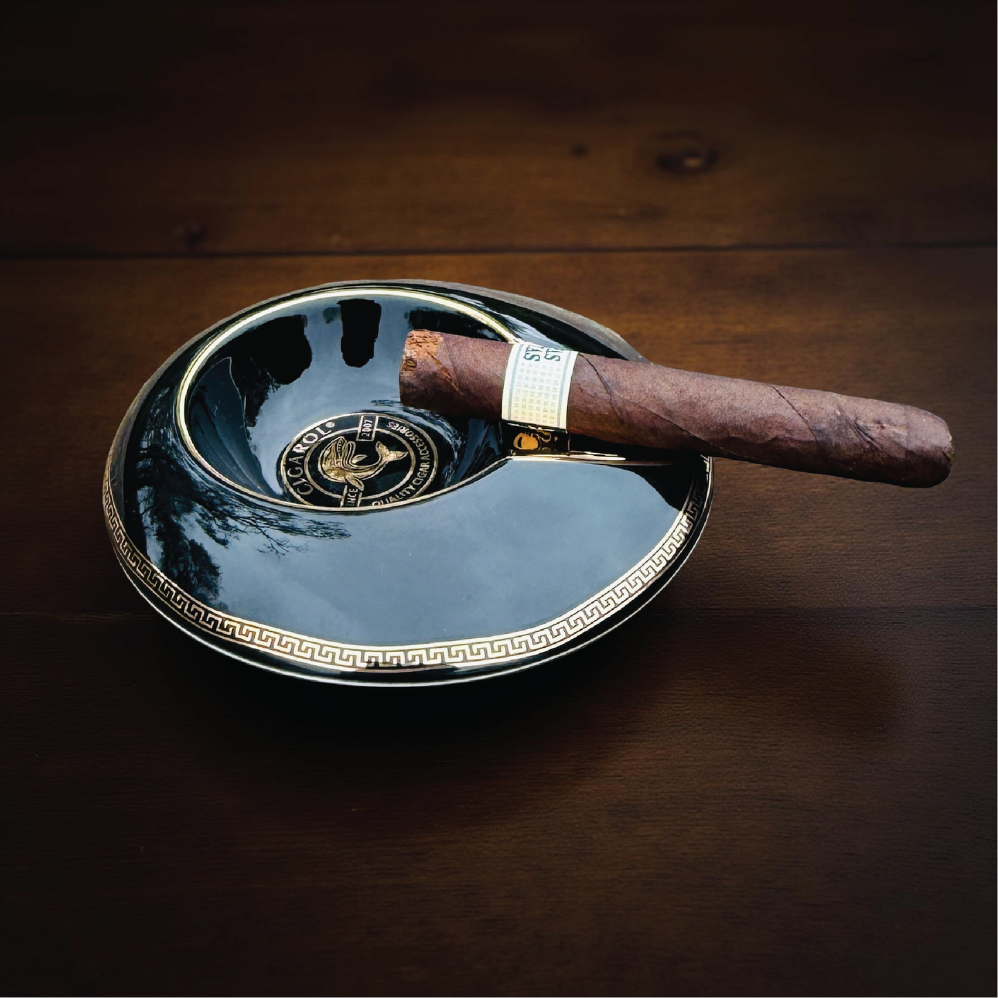 Personalized groomsmen cigar gift set in an engraved wooden crate with a cigar humidor and whiskey glass.
