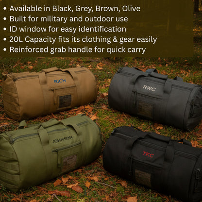 Four cylindrical duffle bags in tan, olive, and black with sample name engravings displayed on ground with fallen leaves.