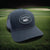 Cotton blend golf hat with trucker mesh, braided visor detail, and snapback closure for adjustable fit