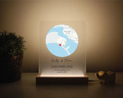 Romantic map sign personalized with custom coordinates, names, and date, available in wood or acrylic with optional LED light stand – perfect for Valentine’s Day, anniversaries, or weddings