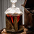 Diamond-shaped whiskey decanter with personalized mahogany stand