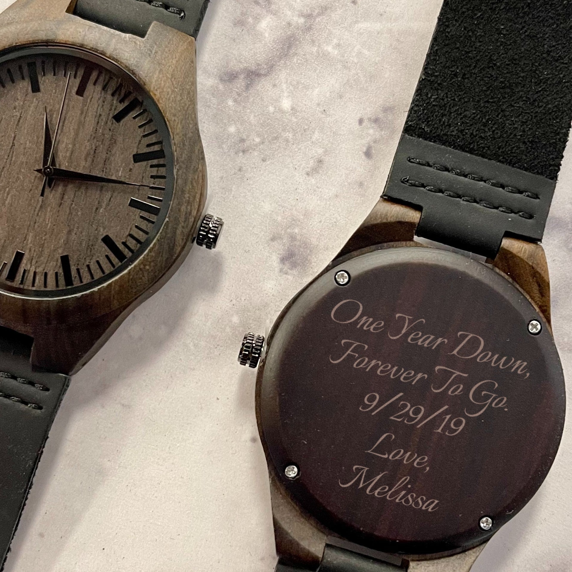 Personalized wood watch crafted from premium Sandalwood with custom engraving on the back, featuring a genuine leather strap, Japanese Quartz movement, and elegant wooden gift box – perfect for anniversaries, birthdays, or special occasions.