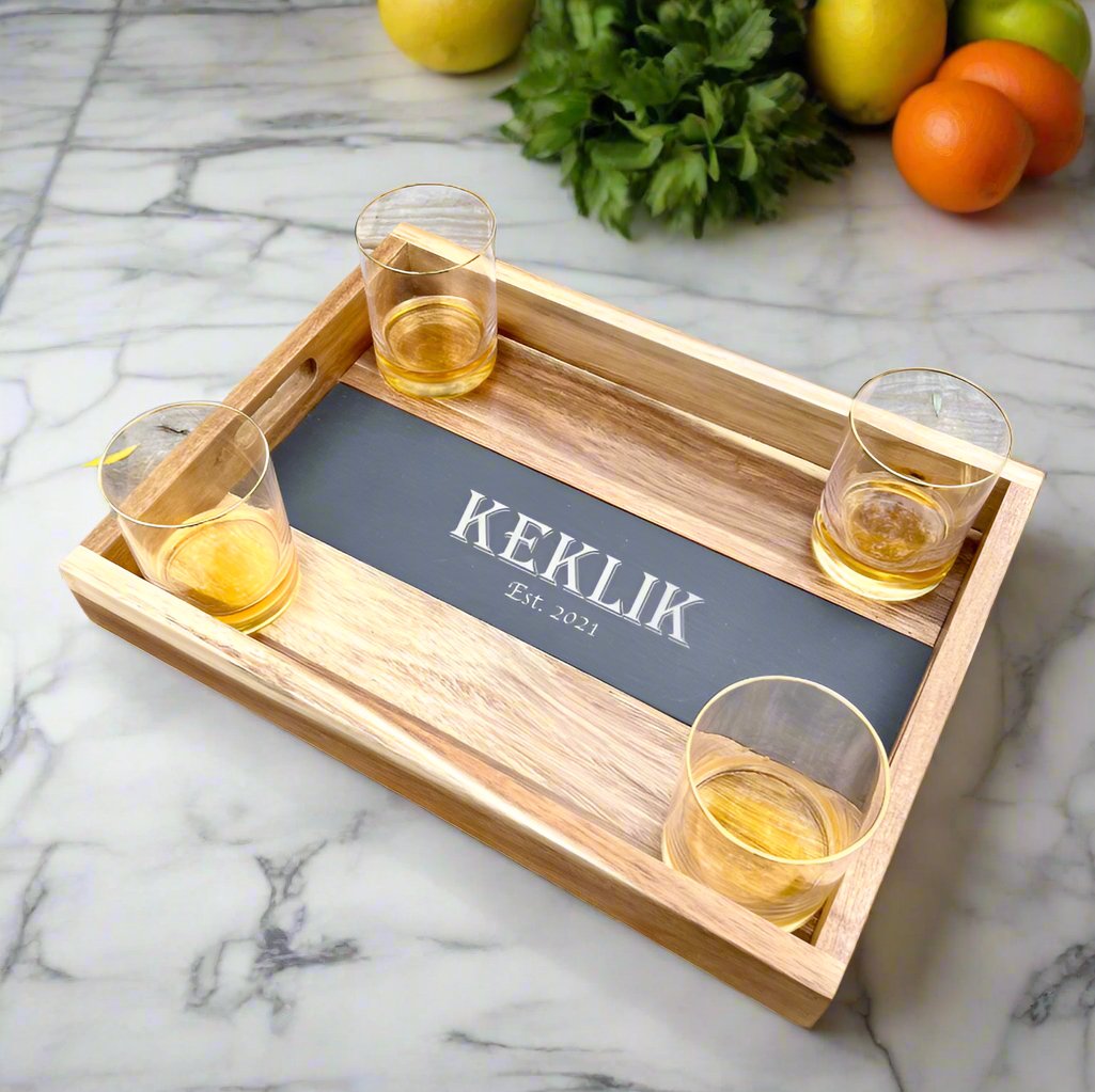 Personalized acacia wood serving tray set with slate insert and gold-rimmed whiskey glasses